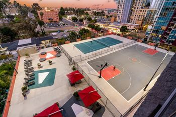 Aerial view of a basketball court and courts in a city